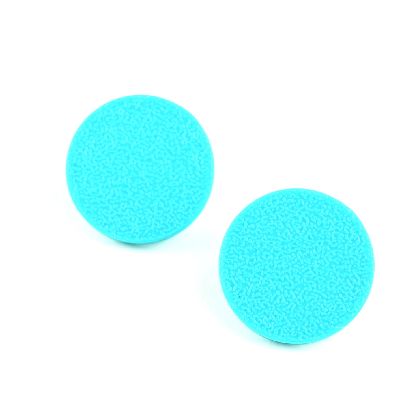 Pair of turquoise round earrings with a textured surface on a white background