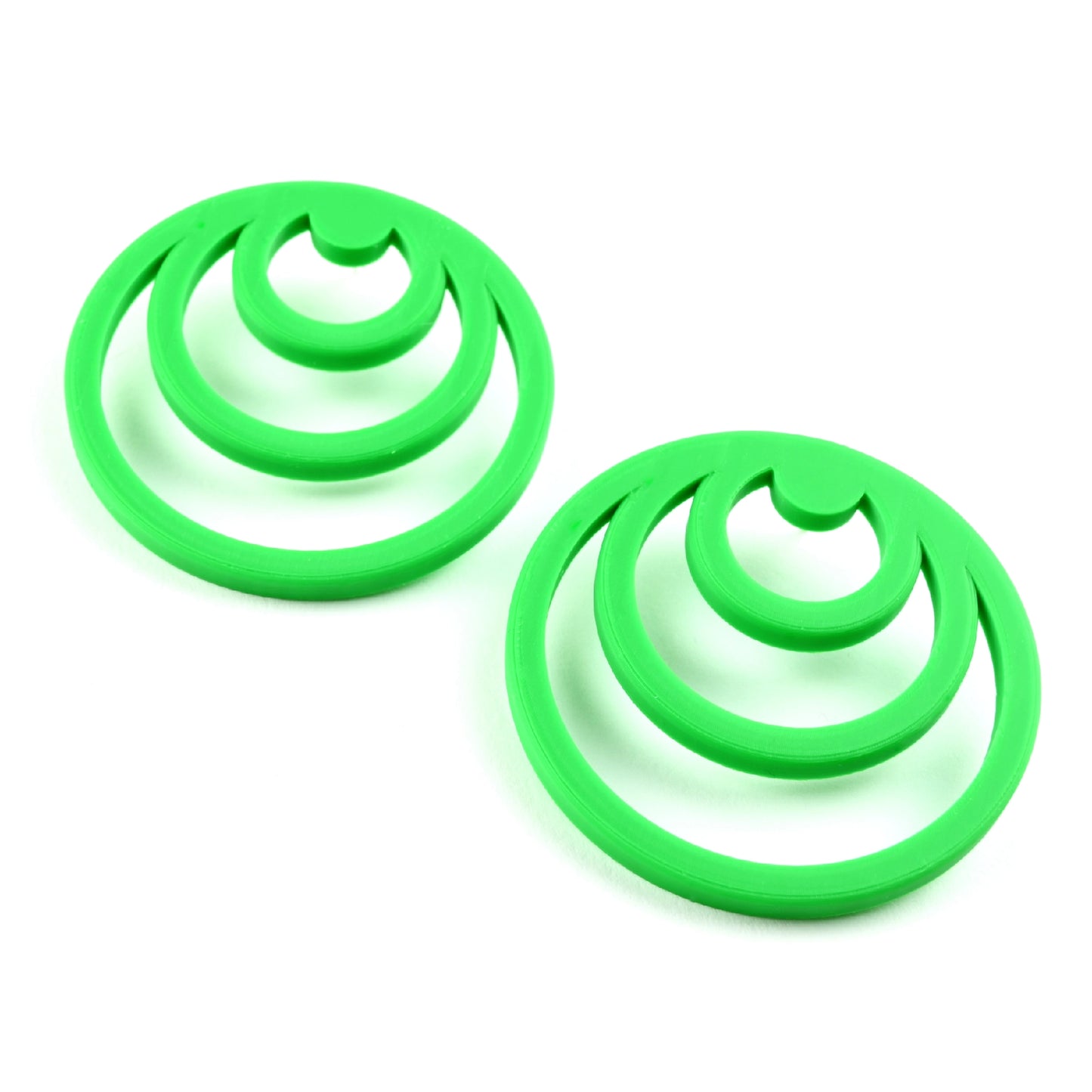 Pair of orange earrings with three orange cirlces inside each other on a white background