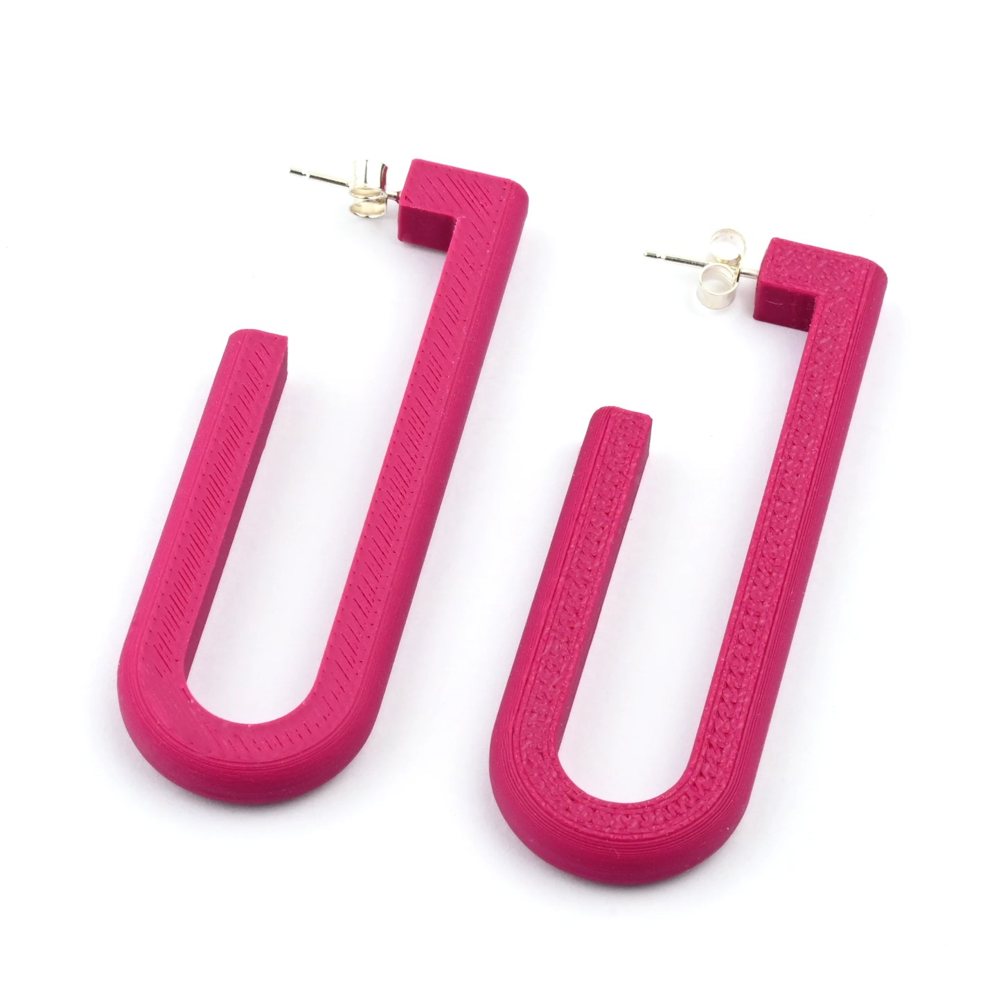 Plum U-shaped hoop earrings on a white background