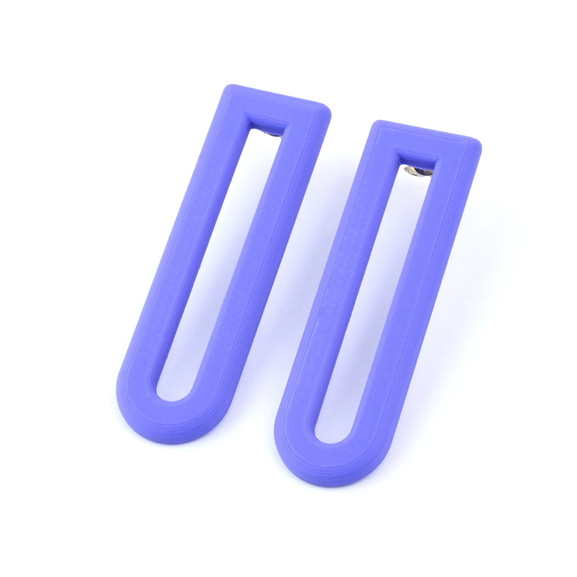 Pair of purple U shaped drop earrings with silver ear posts on a white background