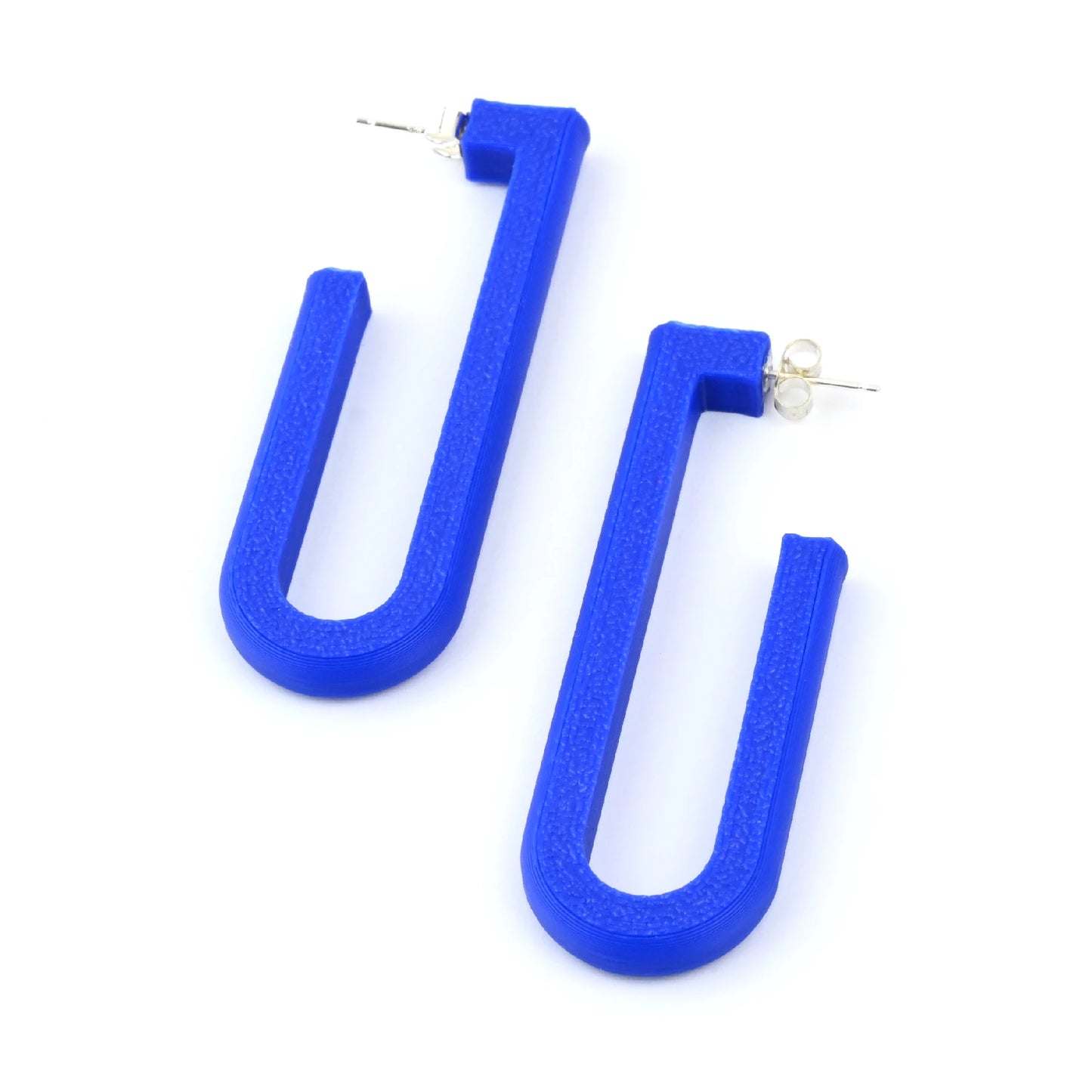 Blue U-shaped hoop earrings on a white background
