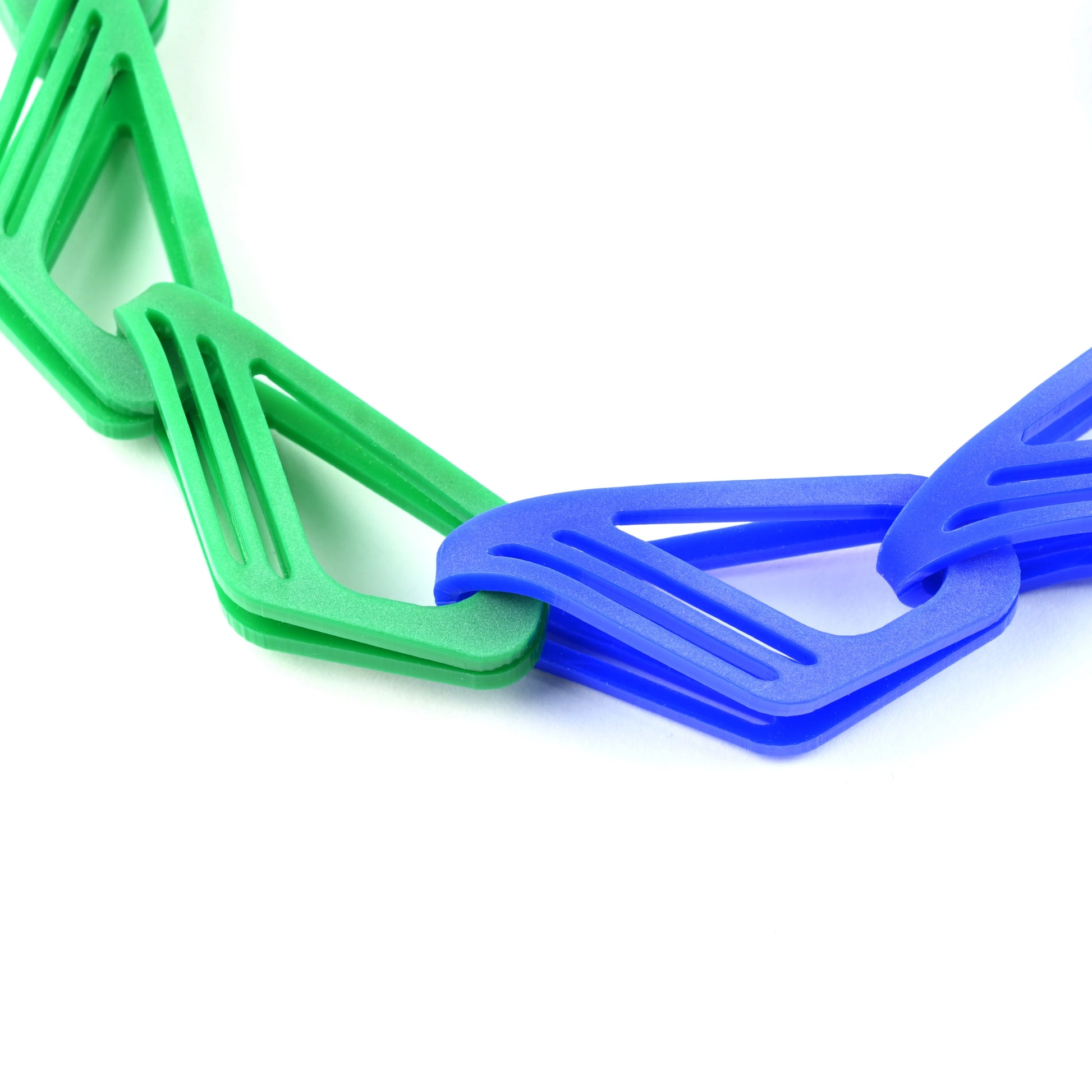 Acrylic blue and green geometric Halite chain by Roxwoods on a white background
