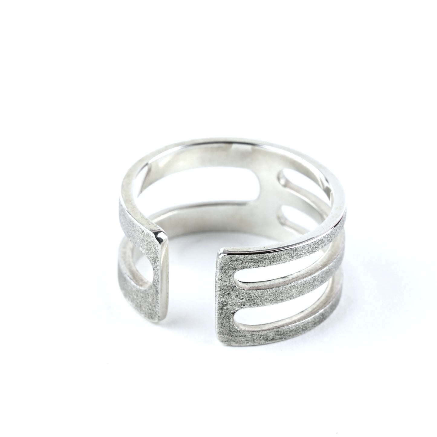 Frost finish Sterling silver geometric chunky mens rings with polished inside on a white background.