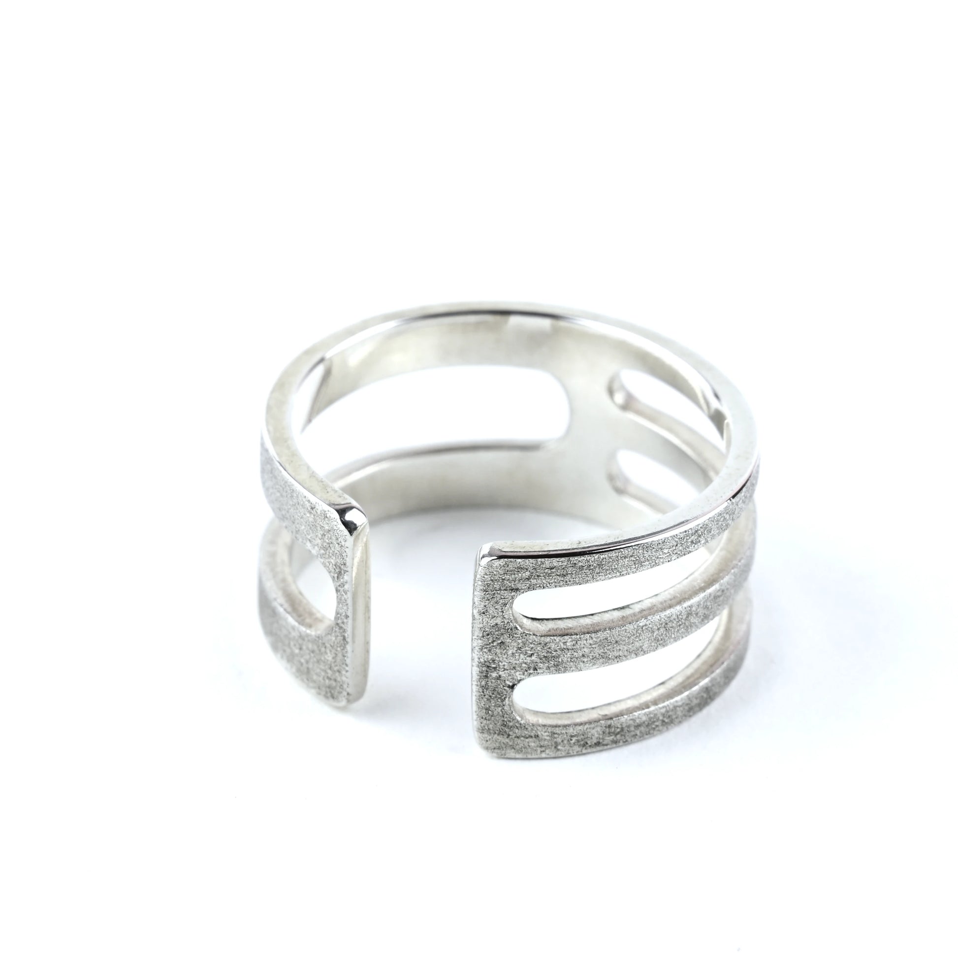 Frost finish Sterling silver geometric chunky mens rings with polished inside on a white background.