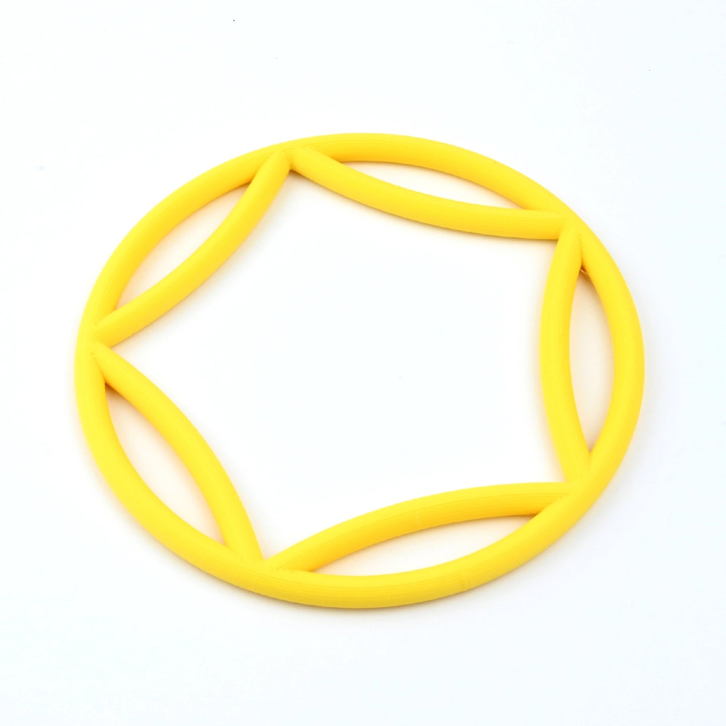 Yellow bangle with a curved  pentagon interior on a white background