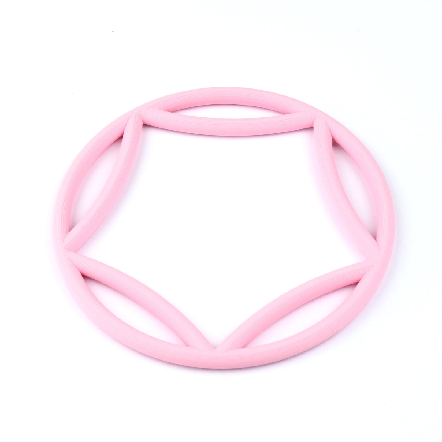 Pale pink bangle with a curved  pentagon interior on a white background