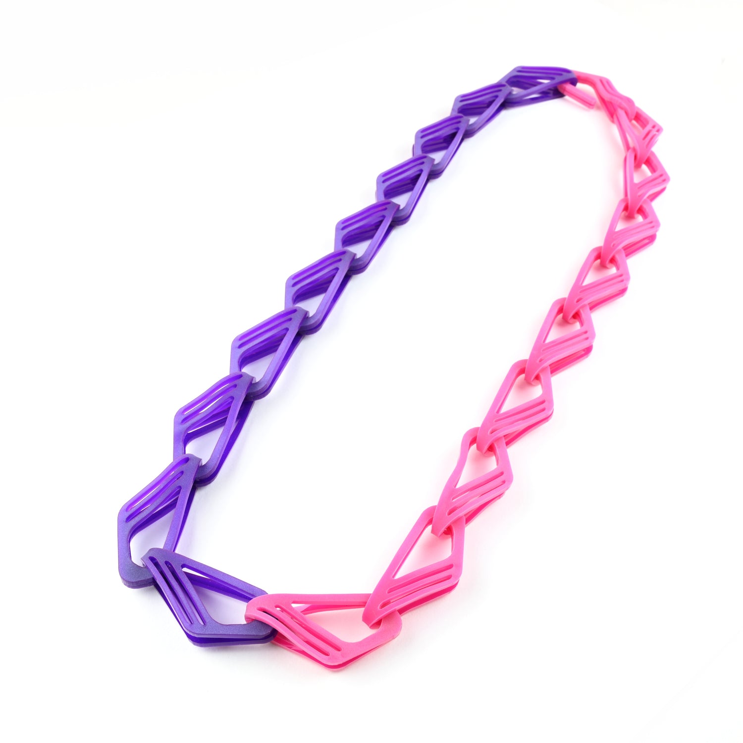 Necklace with pink and purple geometric links on a white background