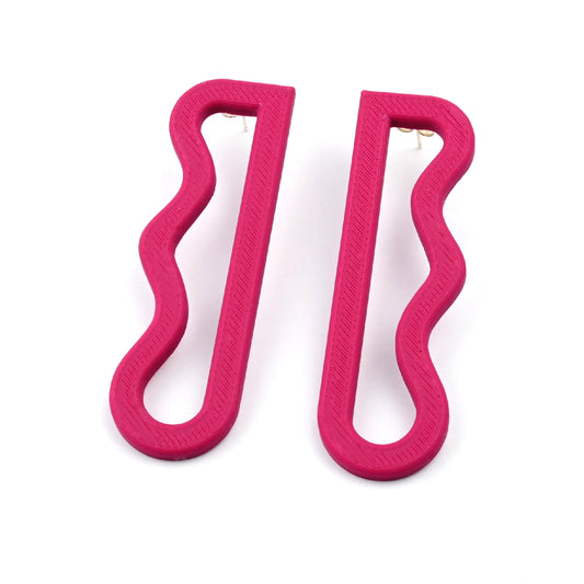 Pair of plum long drop wavy earrings on a white background