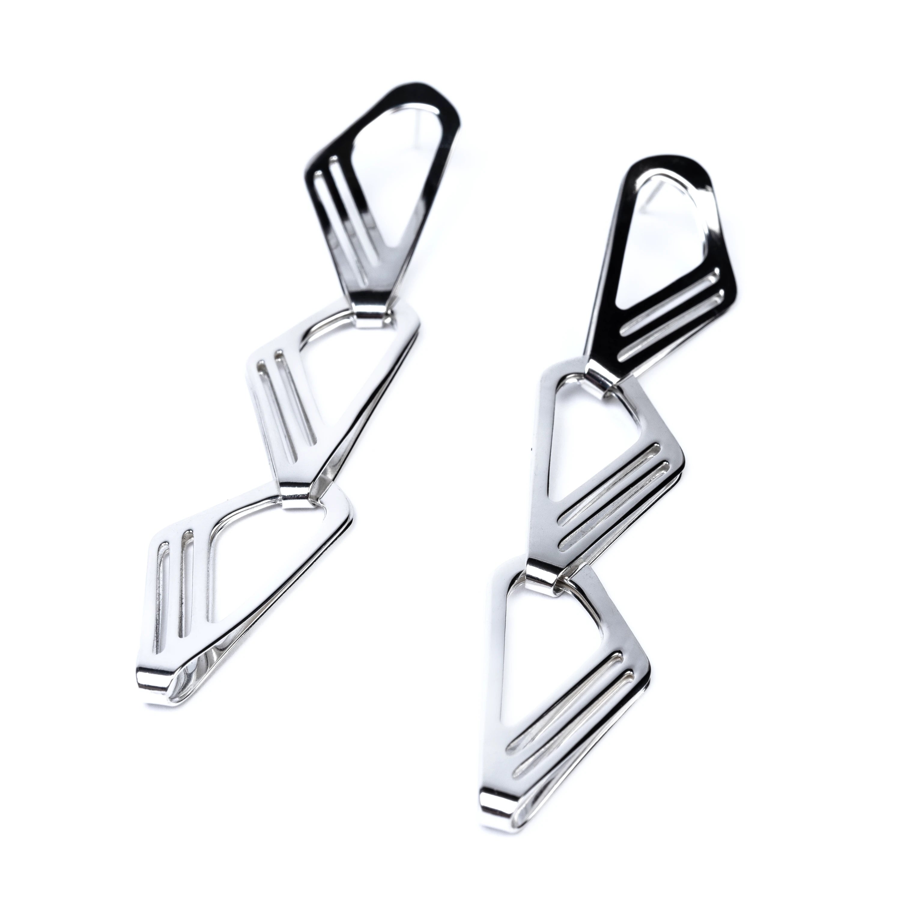 Silver earrings with geometric design by Roxwoods on a white background
