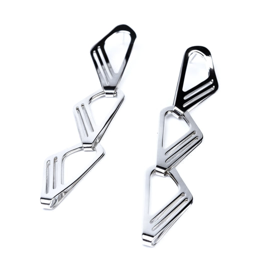Pair of silver earrings with geometric design on a white background