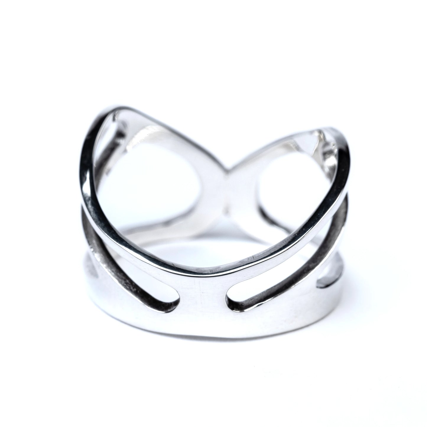 Silver ring with a unique design on a white background