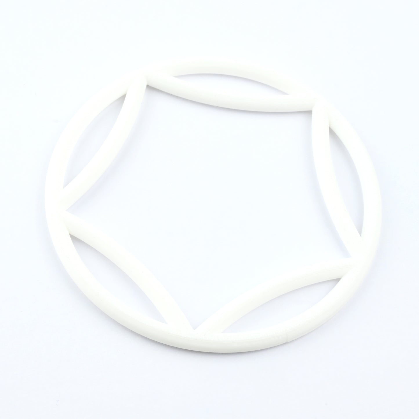 White bangle with a curved  pentagon interior on a white background