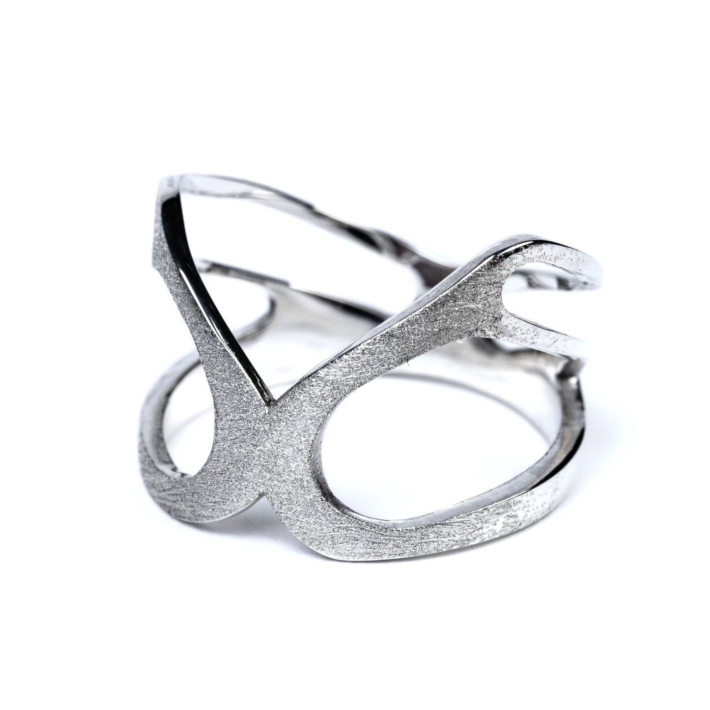 Silver ring with a unique design and sparkly frosted surface on a white background